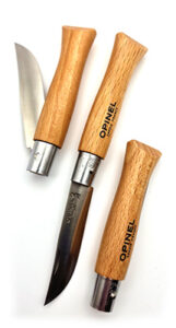 Multiple open and closed views of the Opinel No. 5 Inox pocket knife. 