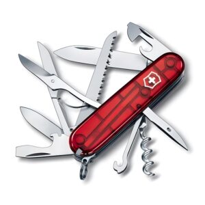 Victorinox Huntsman Translucent Red. A modern multitool with uk legal blade. Shown with all tools open on a white background.